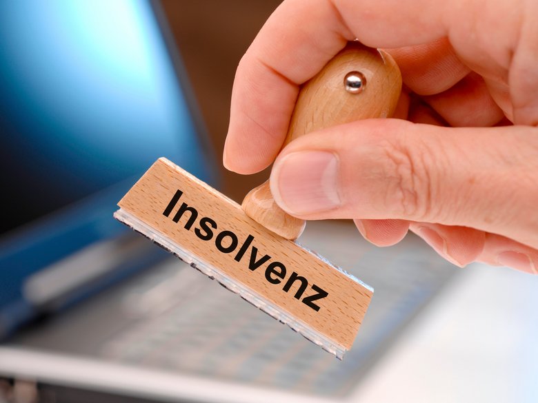 Stempel bedruckt mit dem Wort Insolvenz